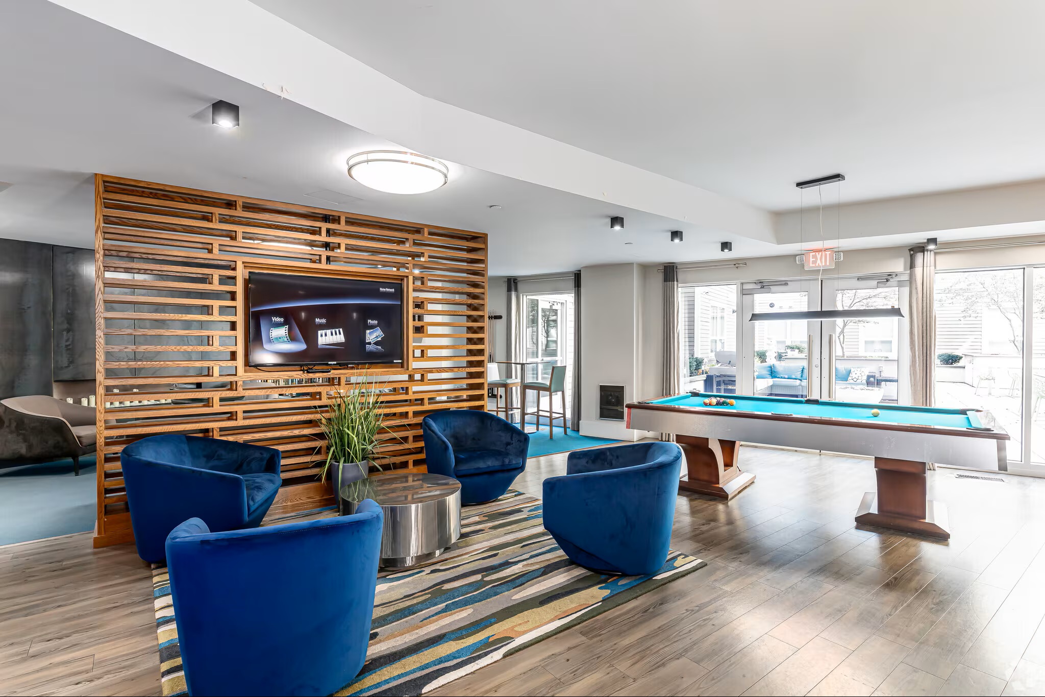 Resident lounge at College & Crown with contemporary seating and community gathering space.
