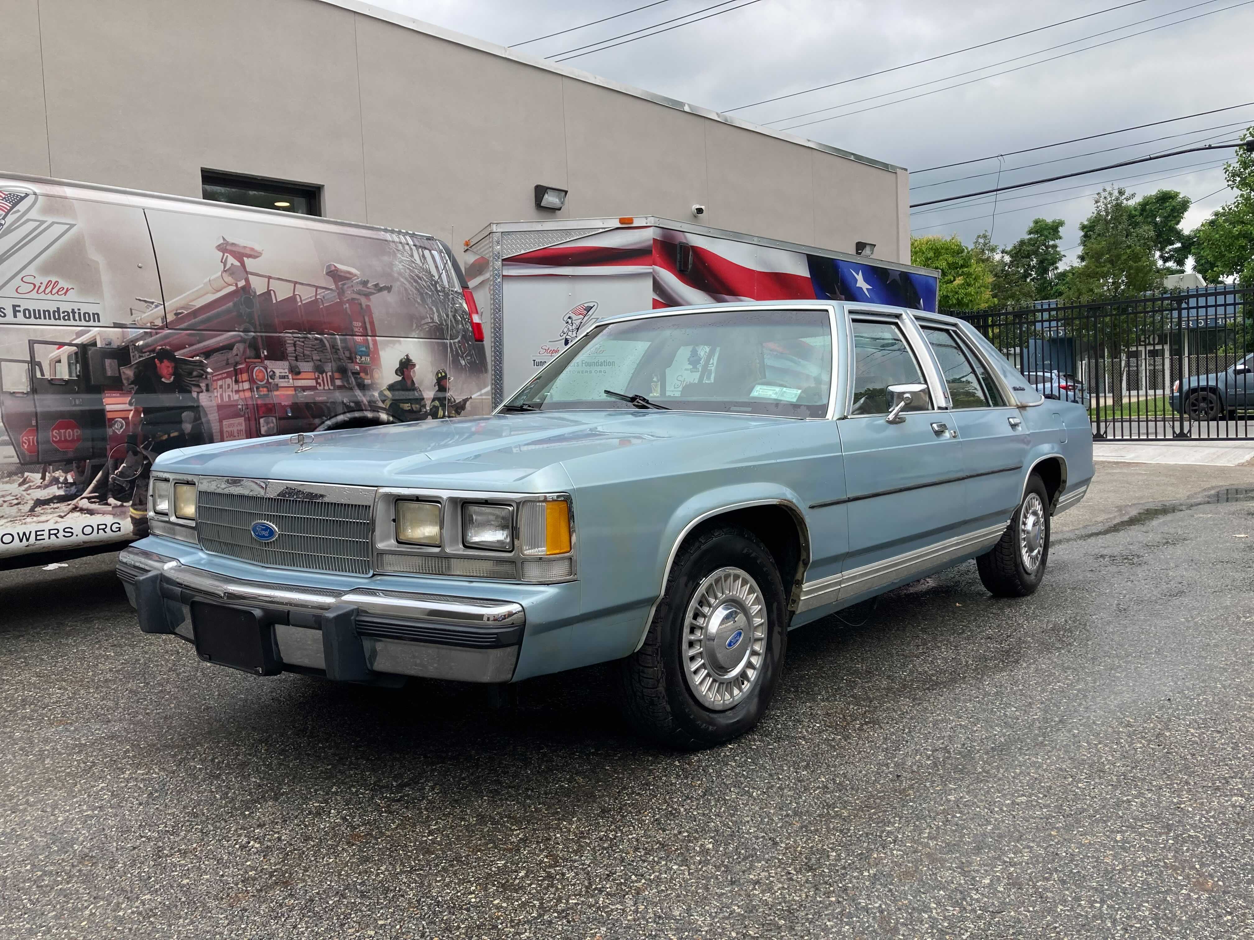 Brian “Q” Quinn’s (The Tenderloins) blue 1991 Ford LTD Crown Victoria featured in “Impractical Jokers: The Movie.” 