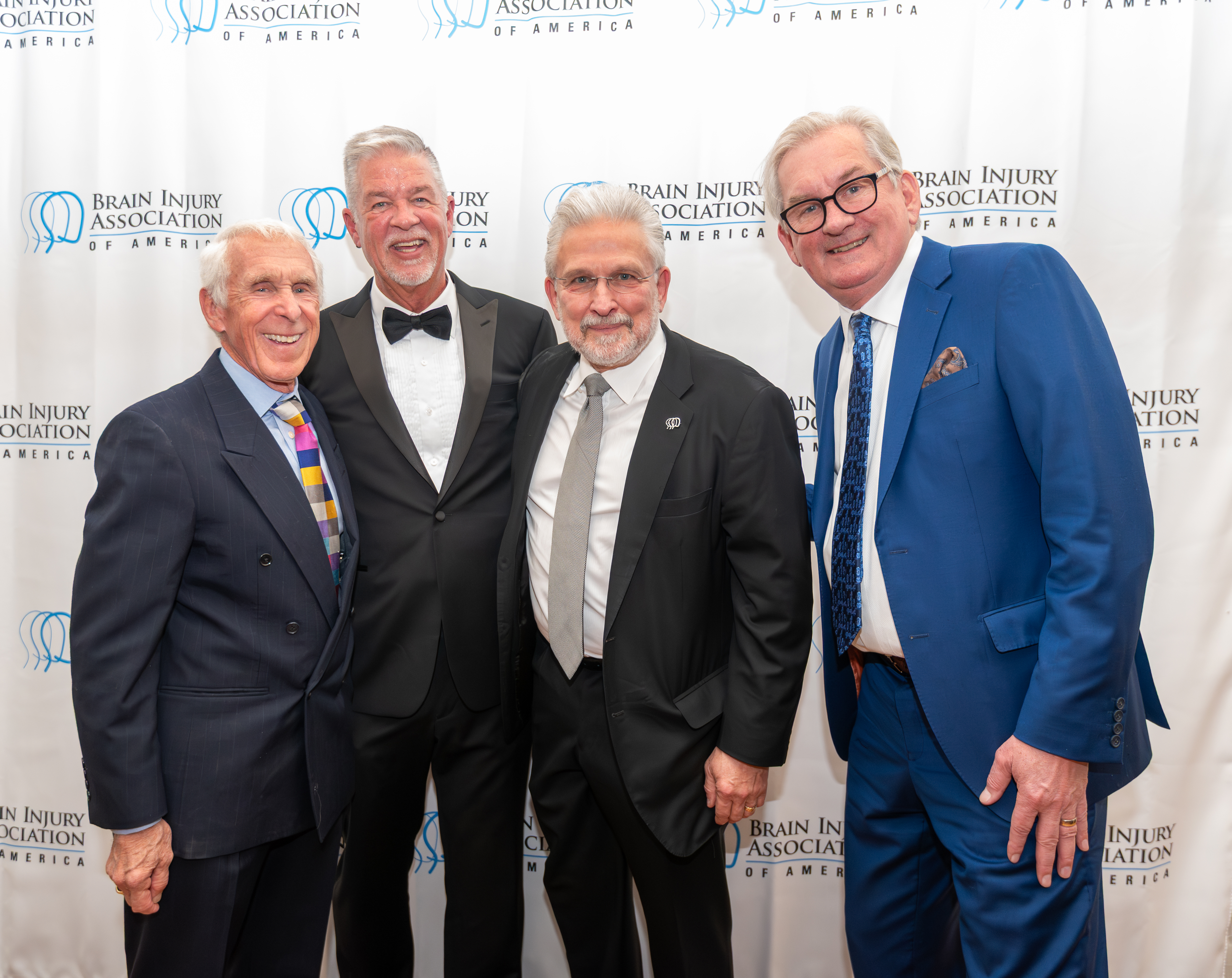 Industry leaders pose at the 2025 National Luminary of the Year event