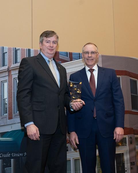 TopLine's President and CEO Tom Smith with Minnesota Credit Union Network President and CEO Mark Cummins
