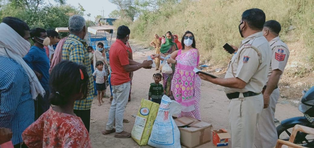 A URI member group distributes pandemic relief supplies in this screenshot from the URI 20th Anniversary Broadcast, available online in full starting June 25, 2020 at: https://youtu.be/Bssre86Dk_8 