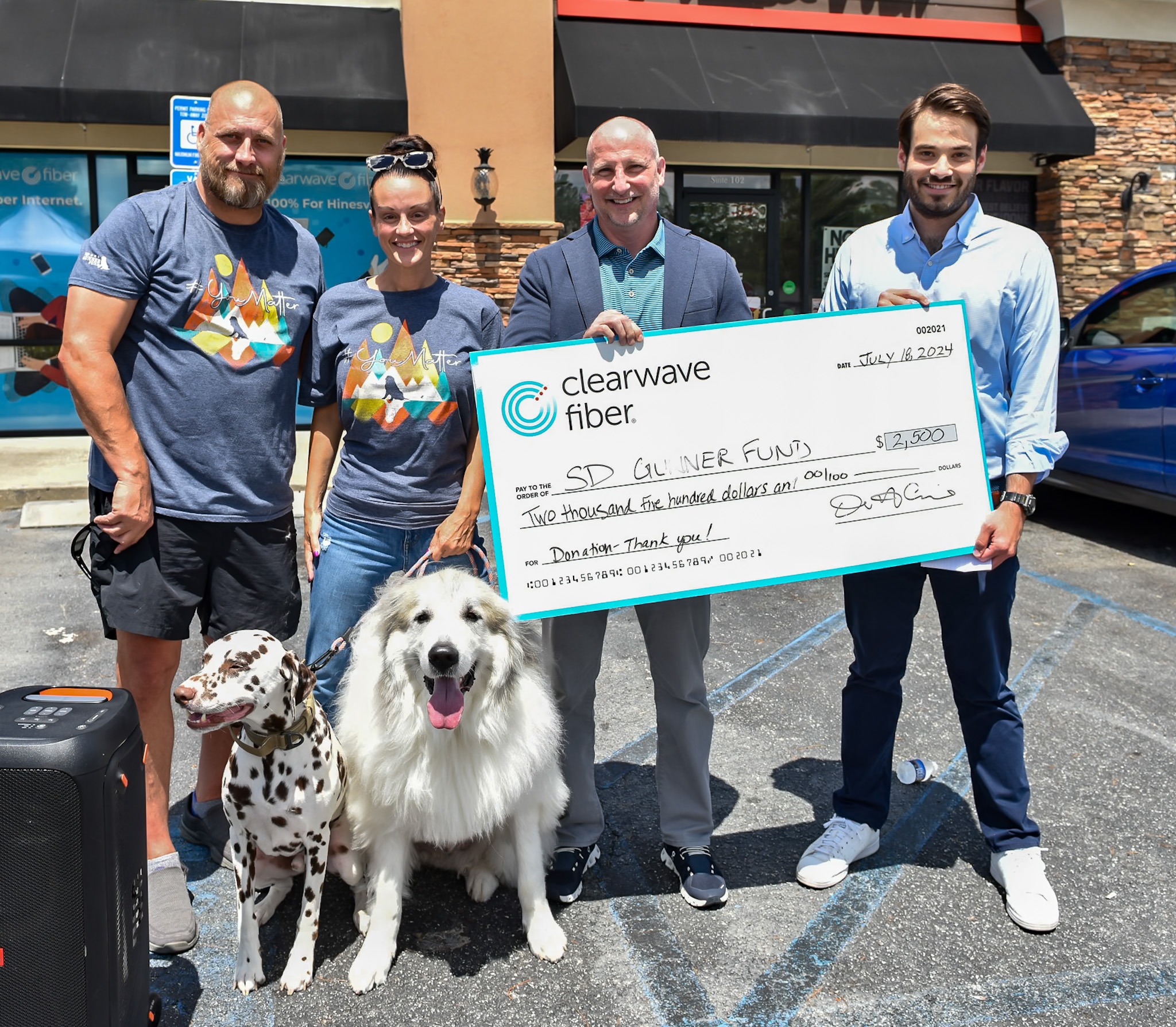 From left, OIF US Army Disabled Veteran and Purple Heart Recipient SGT Hamilton Kinard, founder & CEO of SD Gunner Fund Britnee Kinard, Clearwave Fiber CEO David Armistead and Clearwave Fiber President Charles Lawrence.