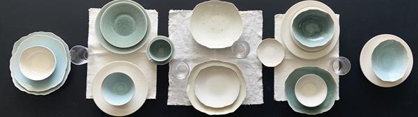 Brides can create a customized tablescape mixing dinnerware and serve ware from the Plume and Vuelta Jars collections. 