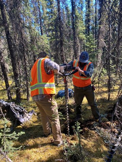 Figure 5. Soil sampling team in action, Fairbanks Gold District, Alaska.