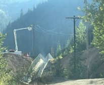 Figure 2: Wilson Construction Co. installing overhead powerlines on Bunker Hill property.