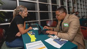 Newport News Shipbuilding talent acquisition representation Lyndsey Hall, left, talks with Michael Patterson about career opportunities with HII during a special hiring event in Virginia Beach on Wednesday, September 13, 2023 (Photo by Lexi Whitehead/HII).