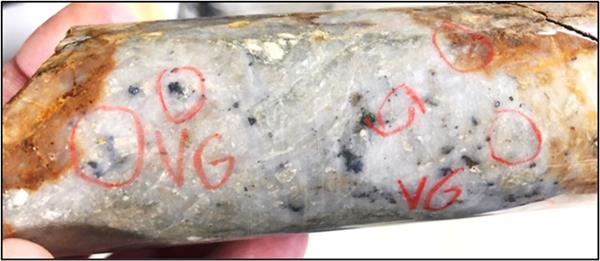 Image 1: More than 30 specks of VG in hole WB22-66