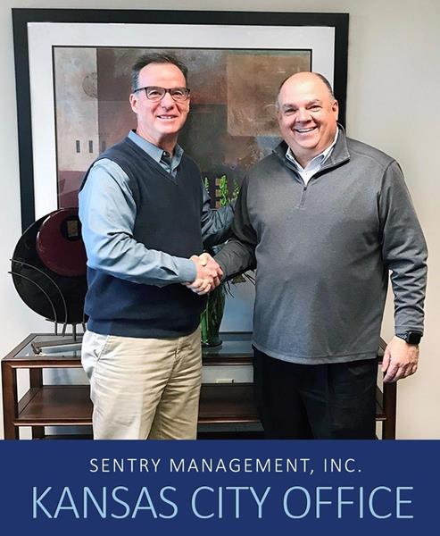 James A. Tiehen, of The Tiehen Group, is welcomed to Sentry Management by President Bradley Pomp. 