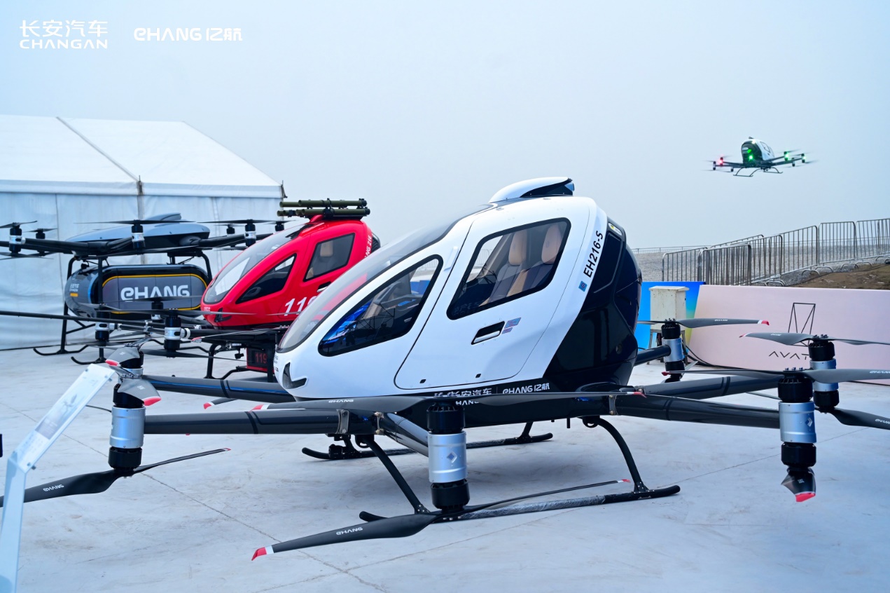 The EH216-S pilotless eVTOL performs a flight demonstration at the signing ceremony, while the EH216-F and EH216-L pilotless eVTOLs are displayed 