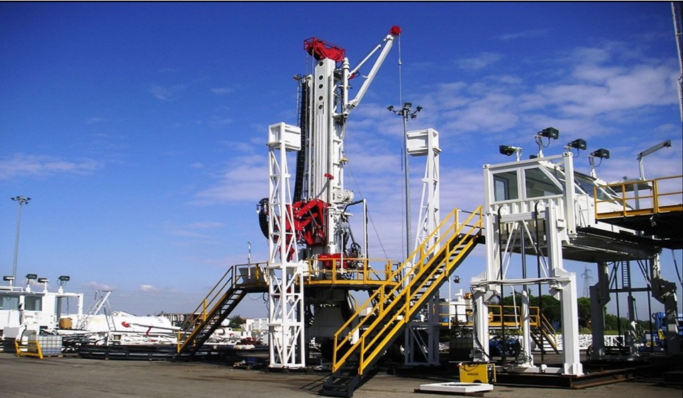 200 Ton Self Walking Drill rig built by Drillmec Inc.  It is designed to walk upright from well to well and is similar in design to the rigs planned for this project.