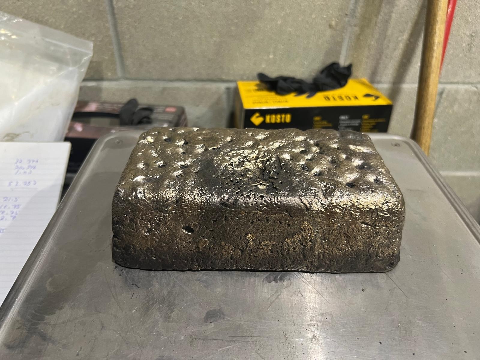 Photograph of the gold bar from the first West Red Lake Gold pour.