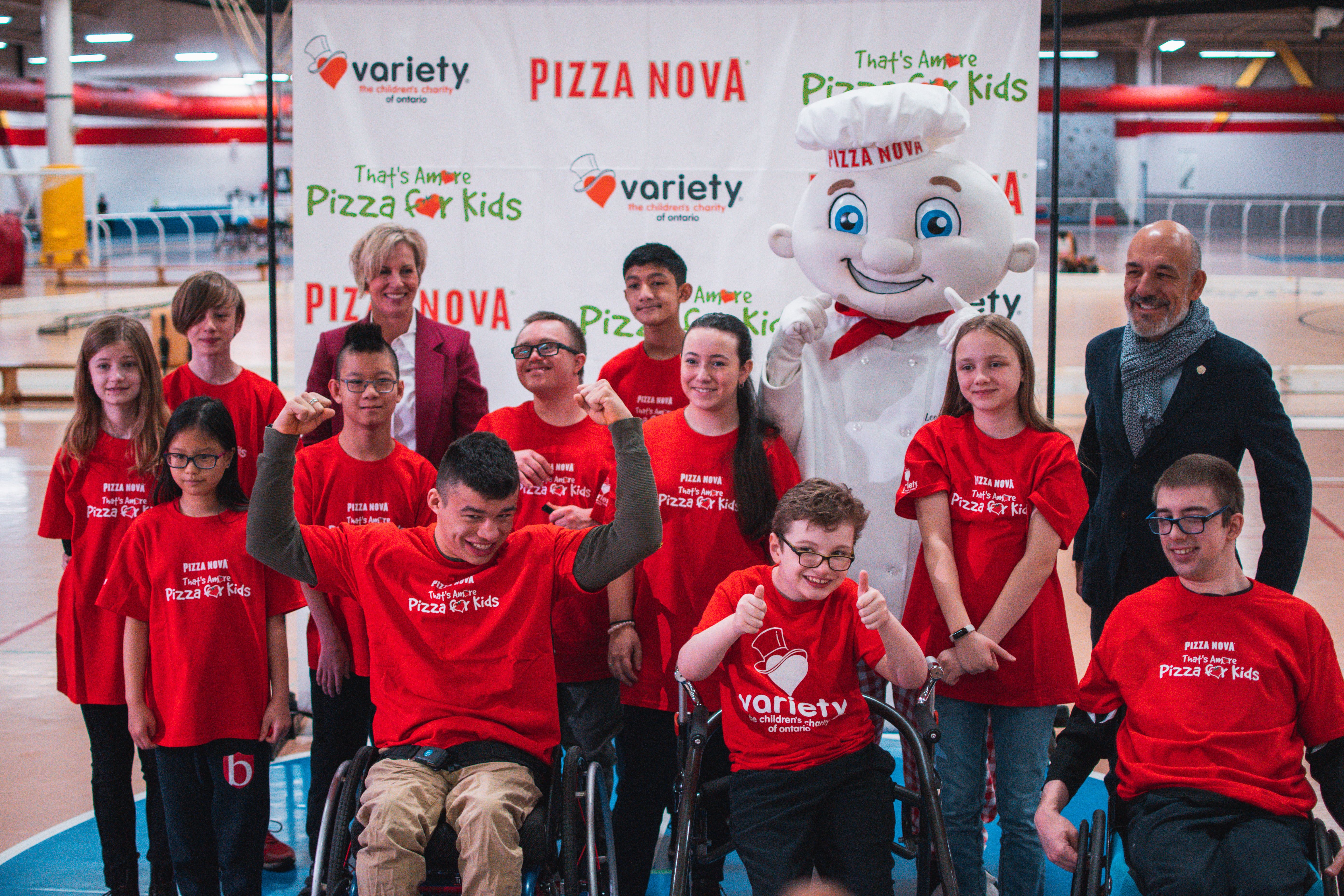 Domenic Primucci, president of Pizza Nova, Karen Stintz, president and CEO of Variety and singer, Roberta Battaglia kick off the 2022 Pizza Nova That’s Amore Pizza for Kids campaign, May 2, at Variety Village in Scarborough, Ont.