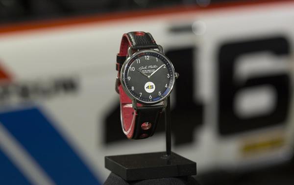 Racing legend John Morton honored with custom wristwatch made from championship Datsun car