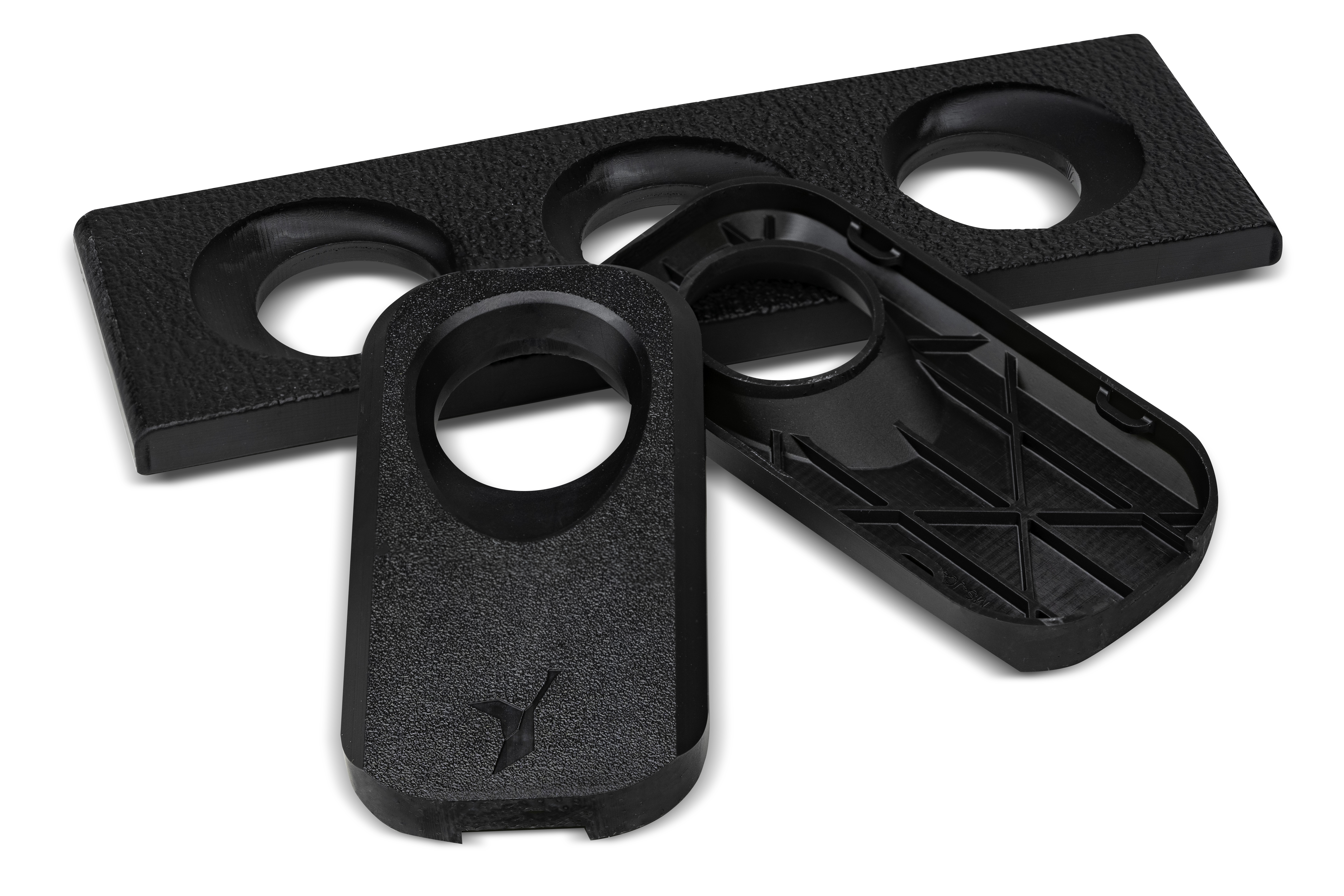 Rigid, flame-retardant consumer electronics and aerospace housings printed in Figure 4 High Temp 150C FR Black, for long-lasting production parts requiring UL94V0, FAR25.853, and FAR 23.853 ratings.