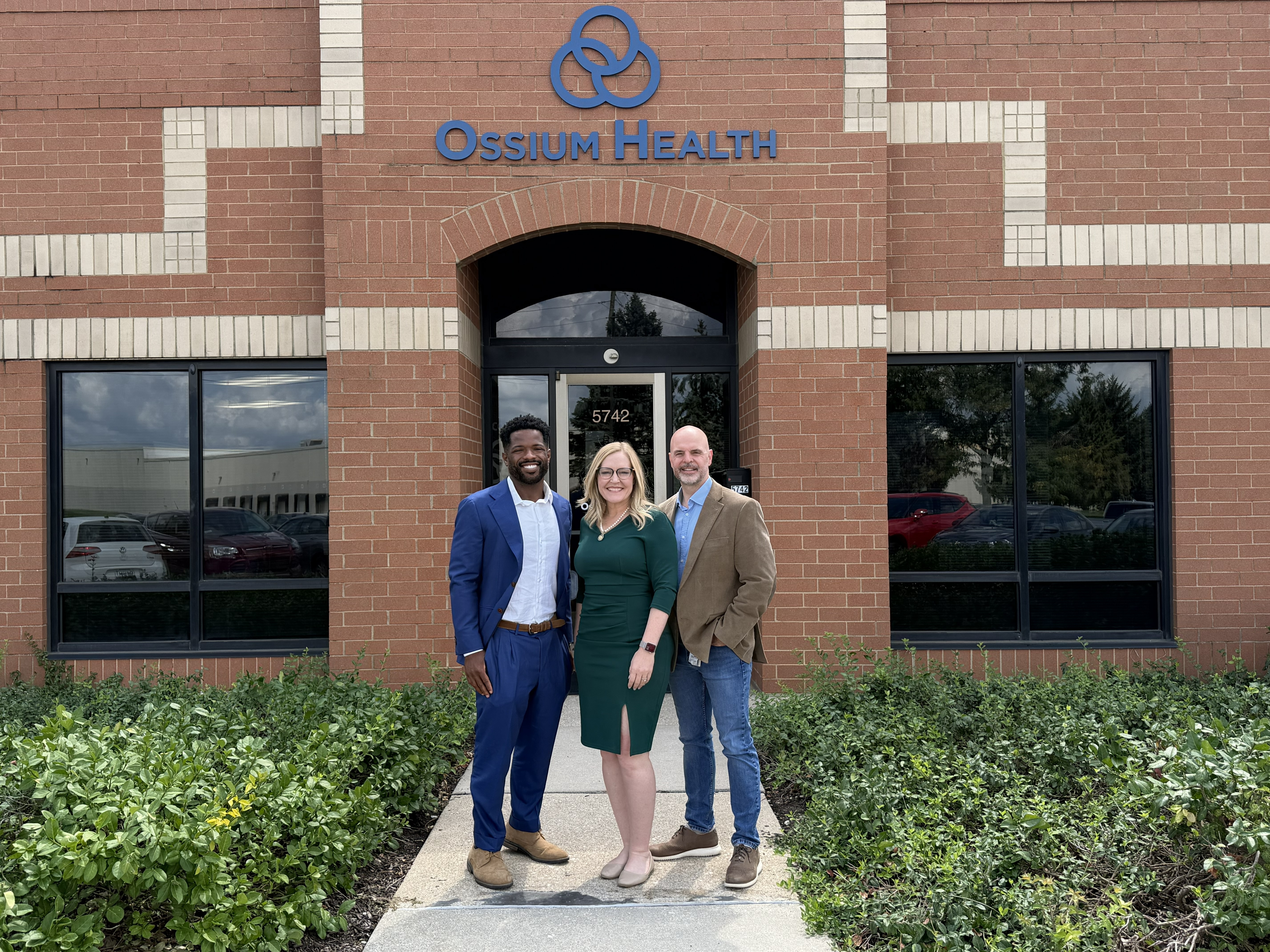 (From left) Ossium CEO, Co-Founder & President Kevin Caldwell, U.S. Rep. Erin Houchin (R-Ind.) and Chief Science Officer and Co-Founder Erik Woods outside Ossium Health's Indianapolis production facility.