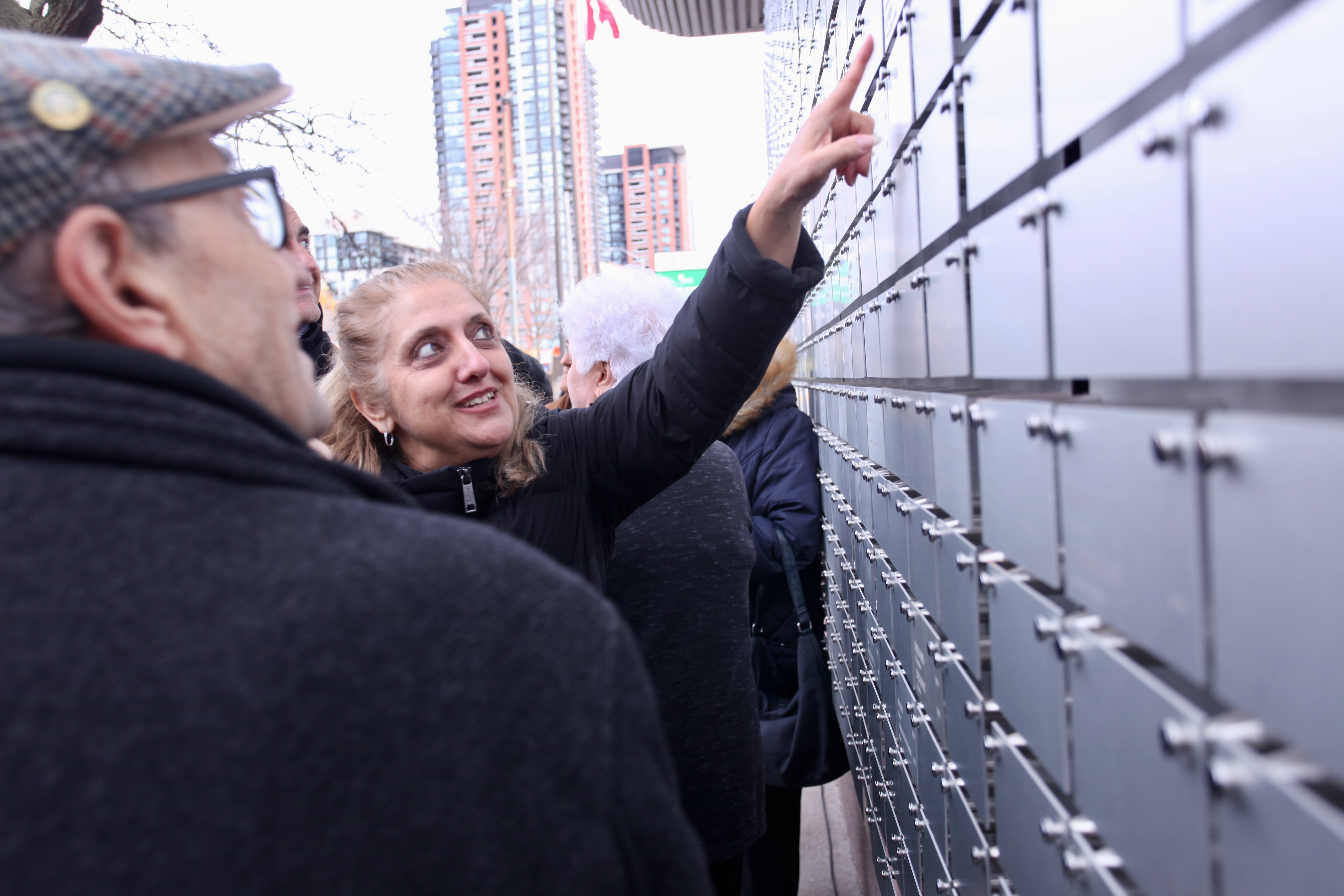 Crowd gathers at Italian Canadian Immigrant Tribute wall