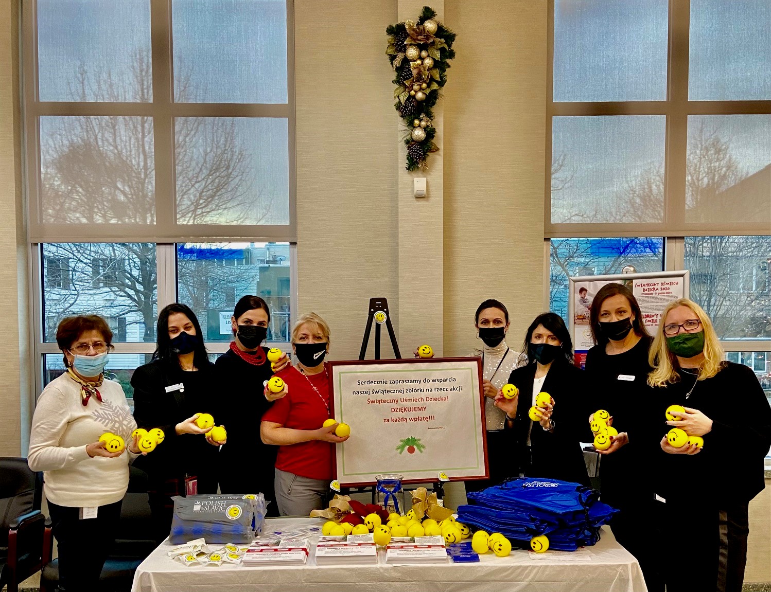 New York's PSFCU McGuinness Branch employees seeking donations during Children's Holiday Smile charity drive in December 2020.