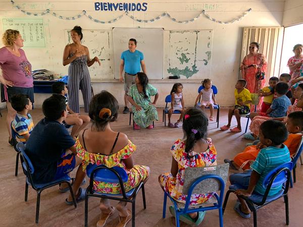 Morgan State University Fulbright-Hays group participants engage in an in-classroom learning experience with students in Colombia.