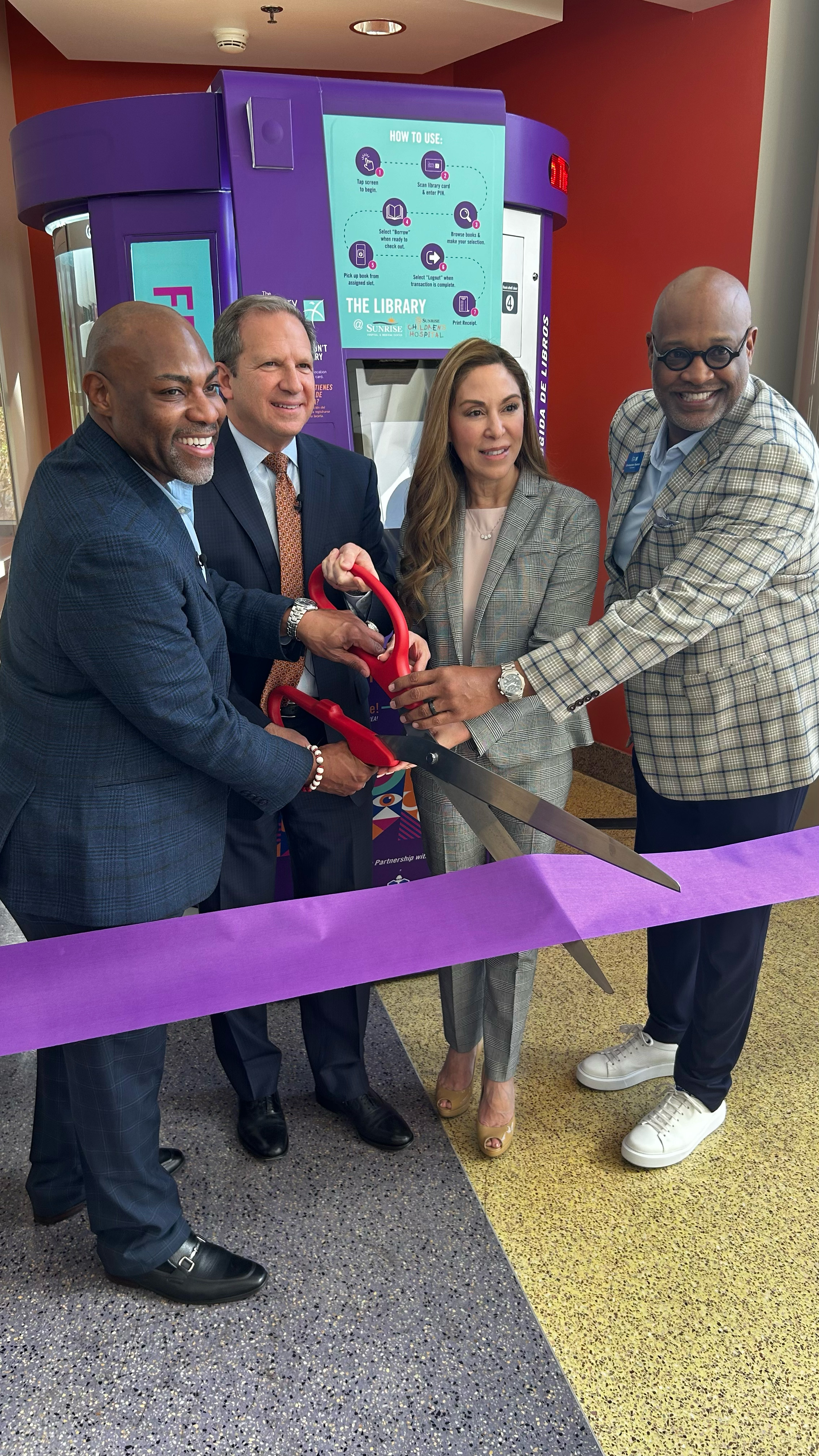 Book vending machine ribbon cutting