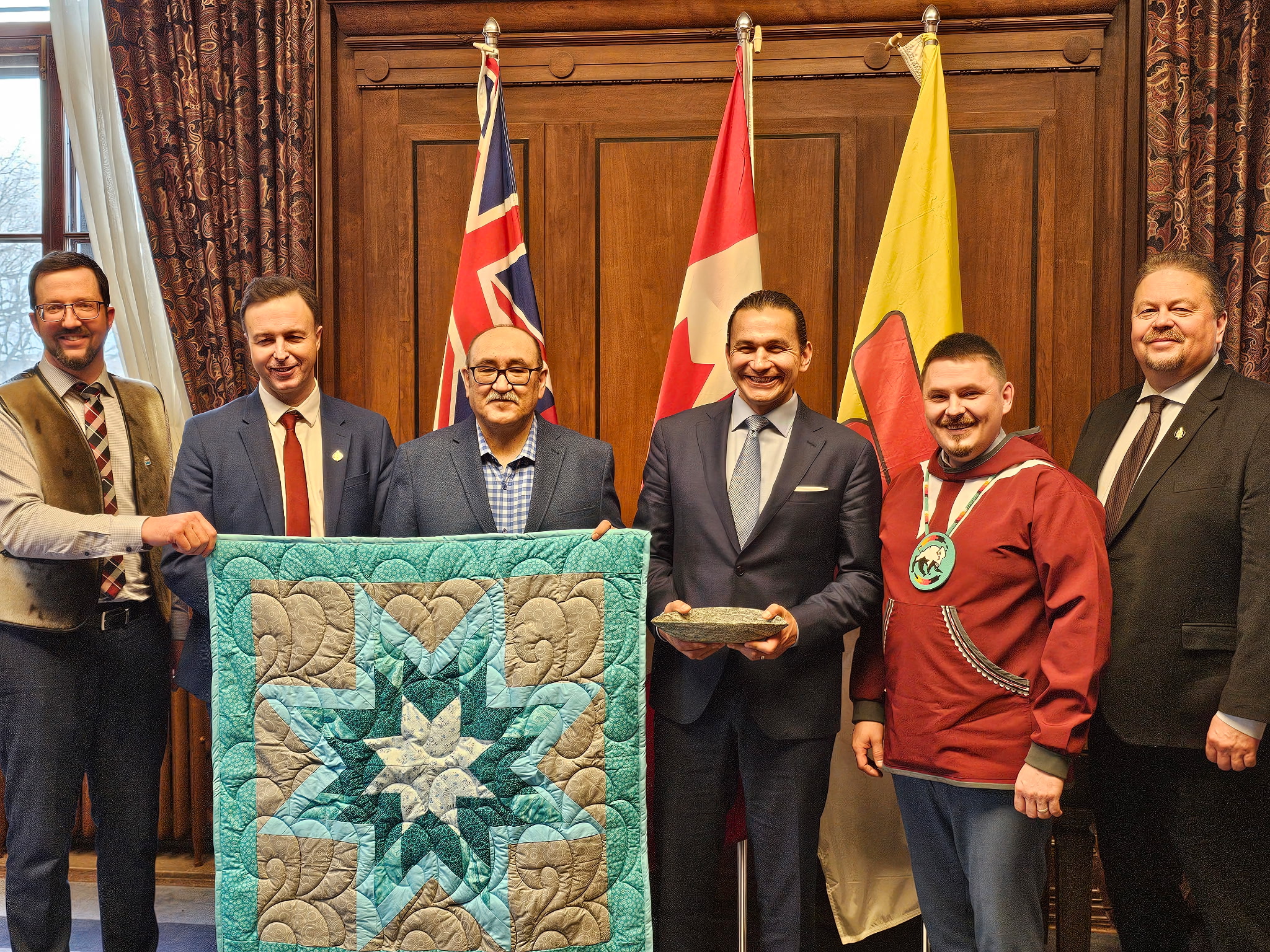 Premiers of Nunavut and Manitoba, along with members of both cabinets and NTI, following signing of KHFL commitment