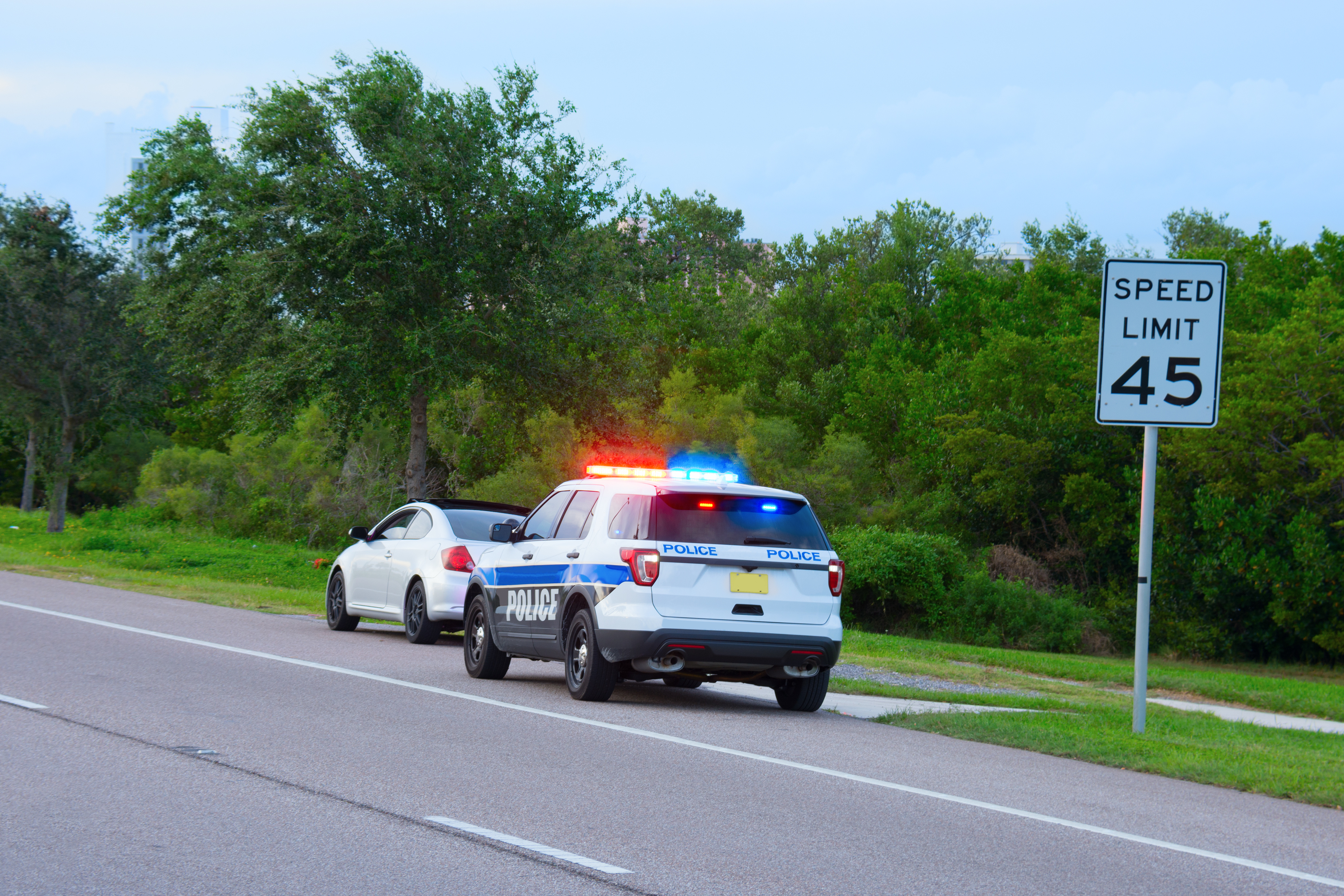 Police car pulls over speeder