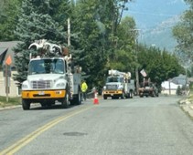 Figure 1: Avista Utilities working to install upgraded power from the nearby substation up Division Street in Wardner and to site.