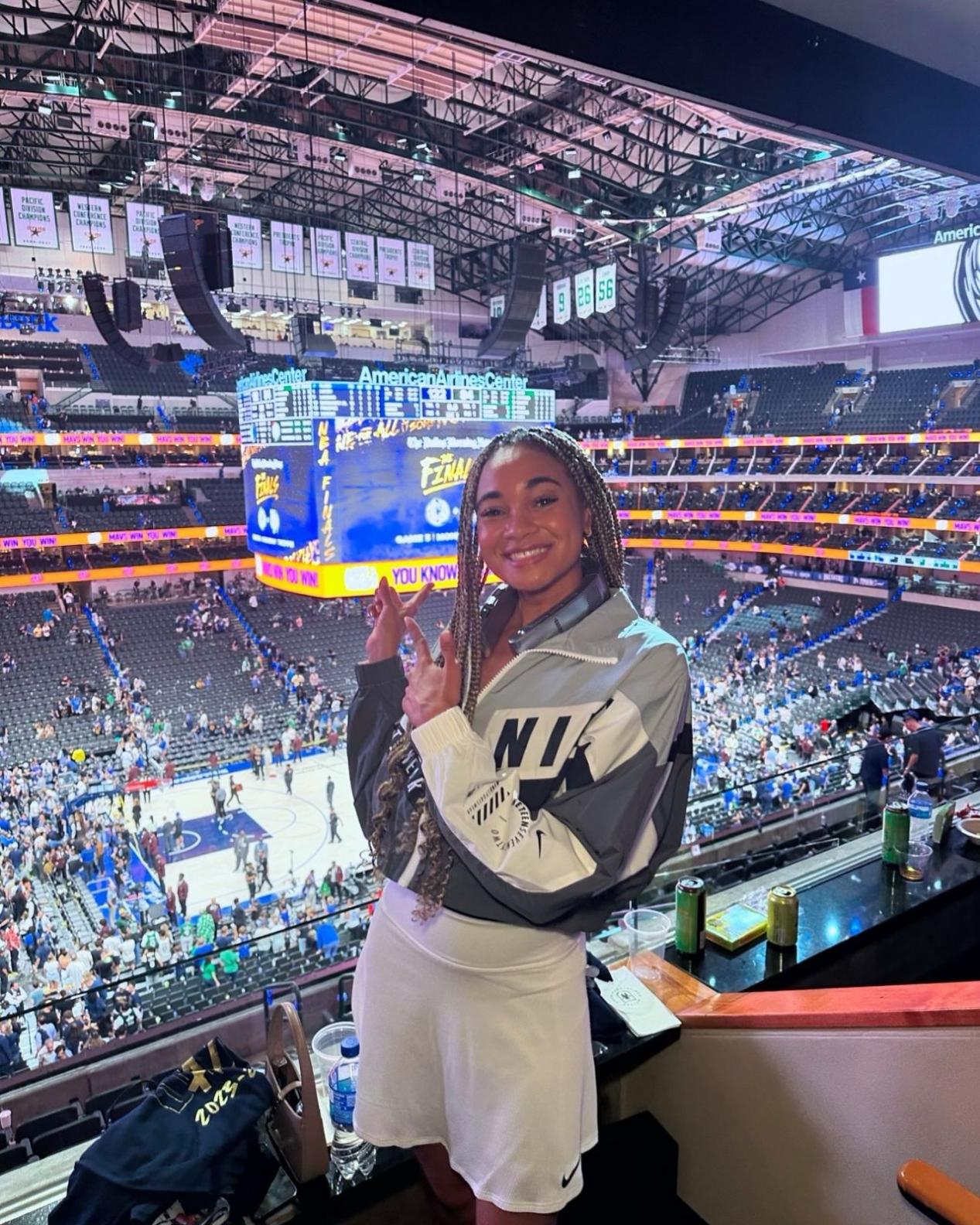Alice Dearing at the Dallas Mavericks Game with TORRAS