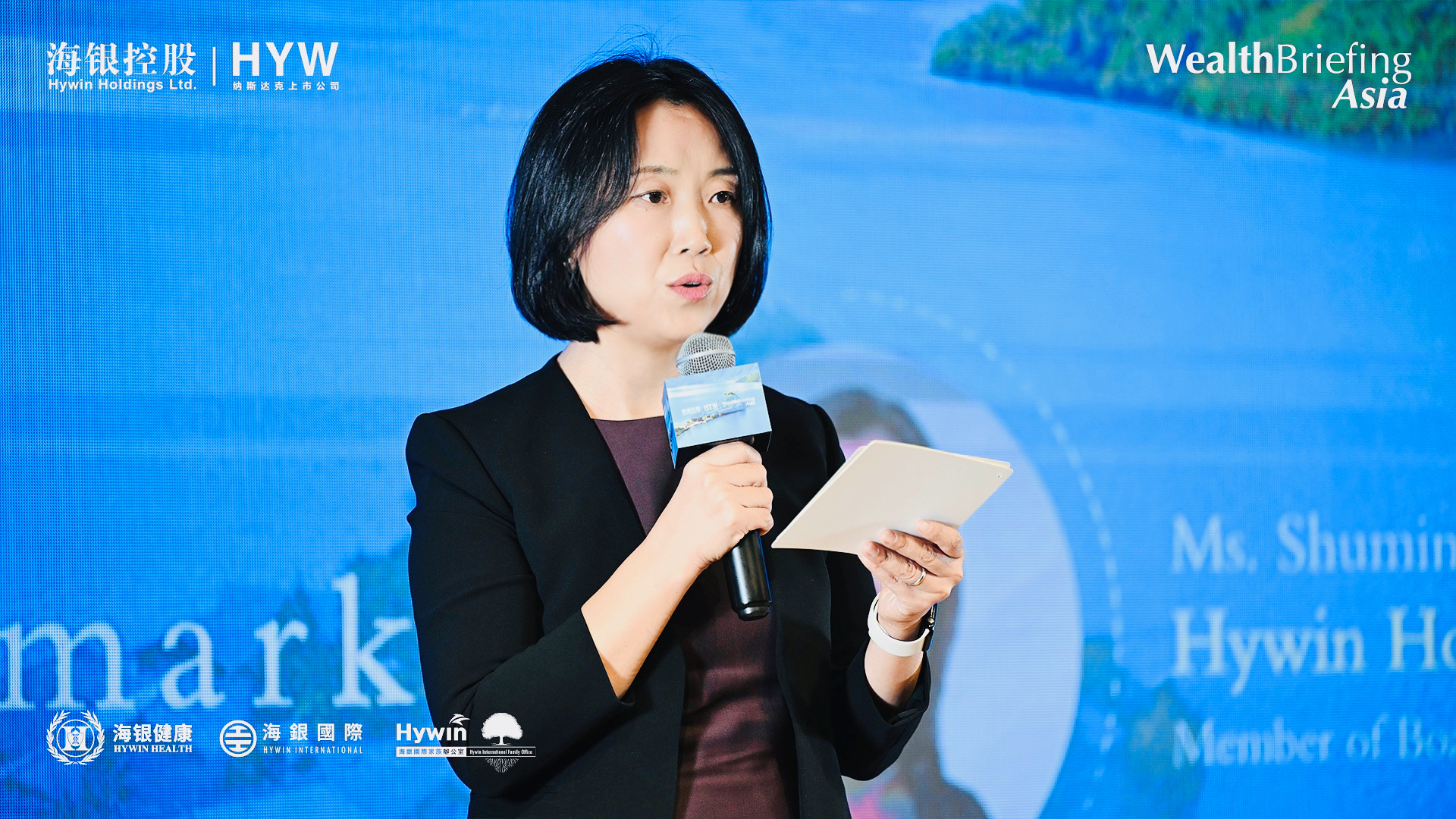 Ms. Shuming Zhu speaking at the ceremony