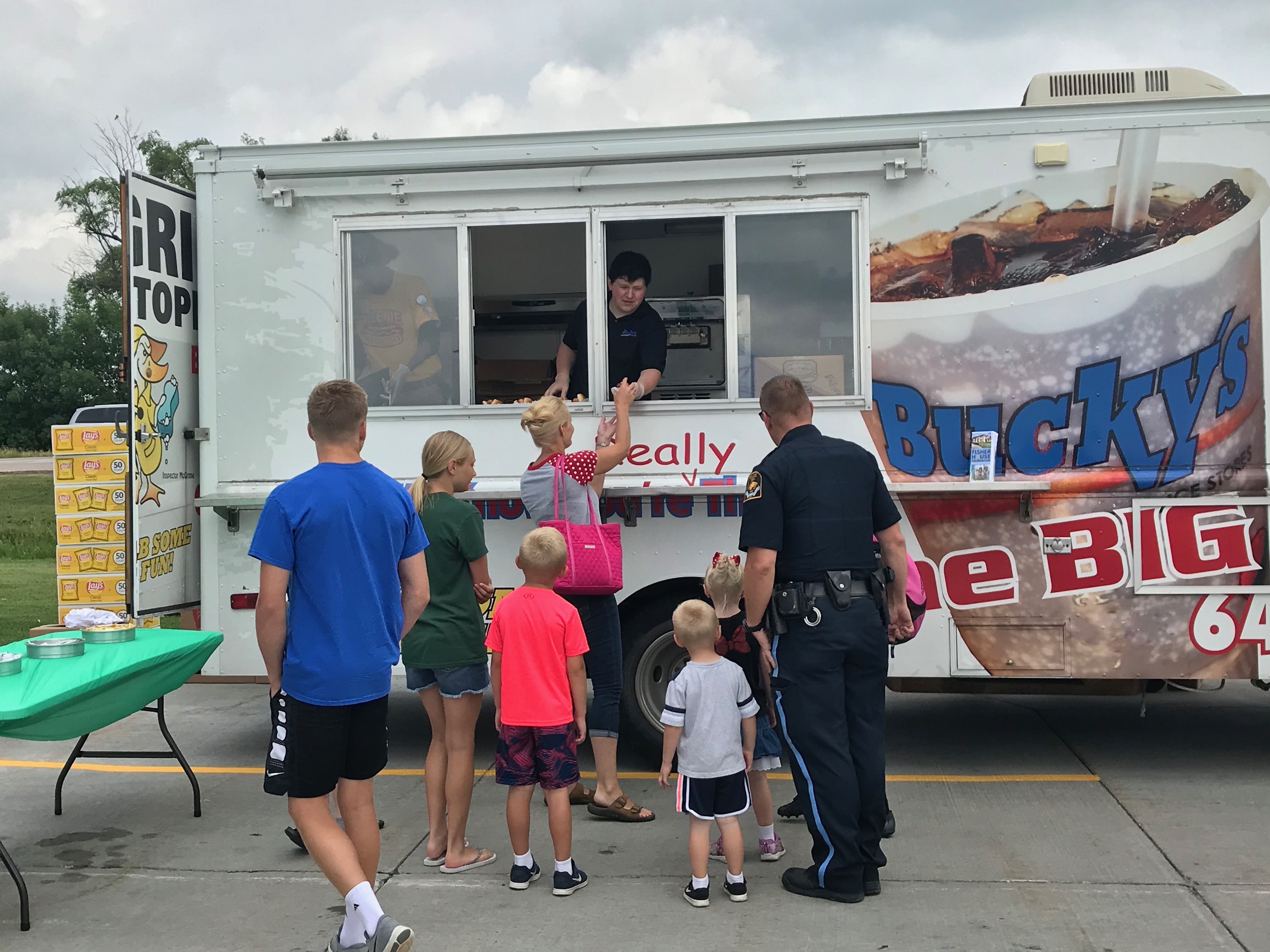 Bucky’s Convenience Stores donated, grilled and served more than 1,000 hot dogs, chips and drinks during Weenie Wednesdays at the Veridian Credit Union on West Maple in Omaha.  For each person through the line, Veridian donated $1.03 to Fisher House Foundation—an amount that corresponded with KXKT’s dial position, 103.7, which came up with the idea and supported the efforts on air throughout the fundraiser.