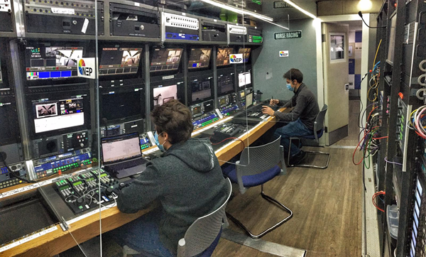 The NEP crew operate safely for the ITV productions with health and safety measures like workstation dividers and social distancing in place.