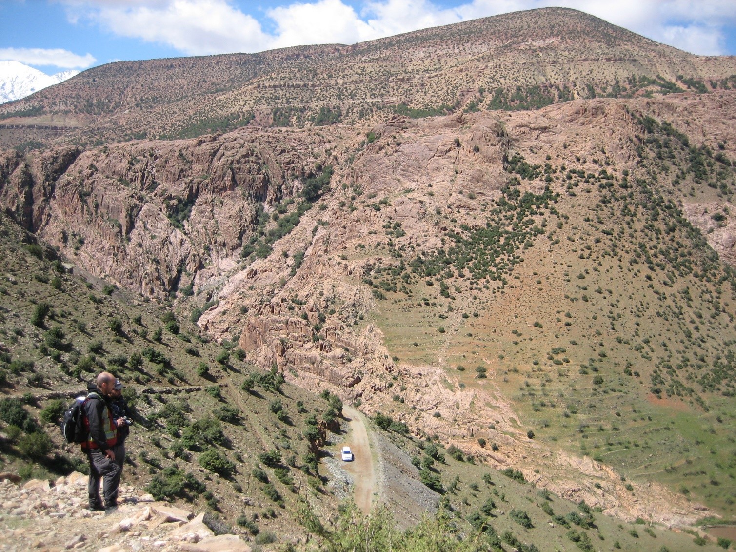 Walking the ground mineralized sector with granite on the other side of the river with younger sedimentary rock in the background