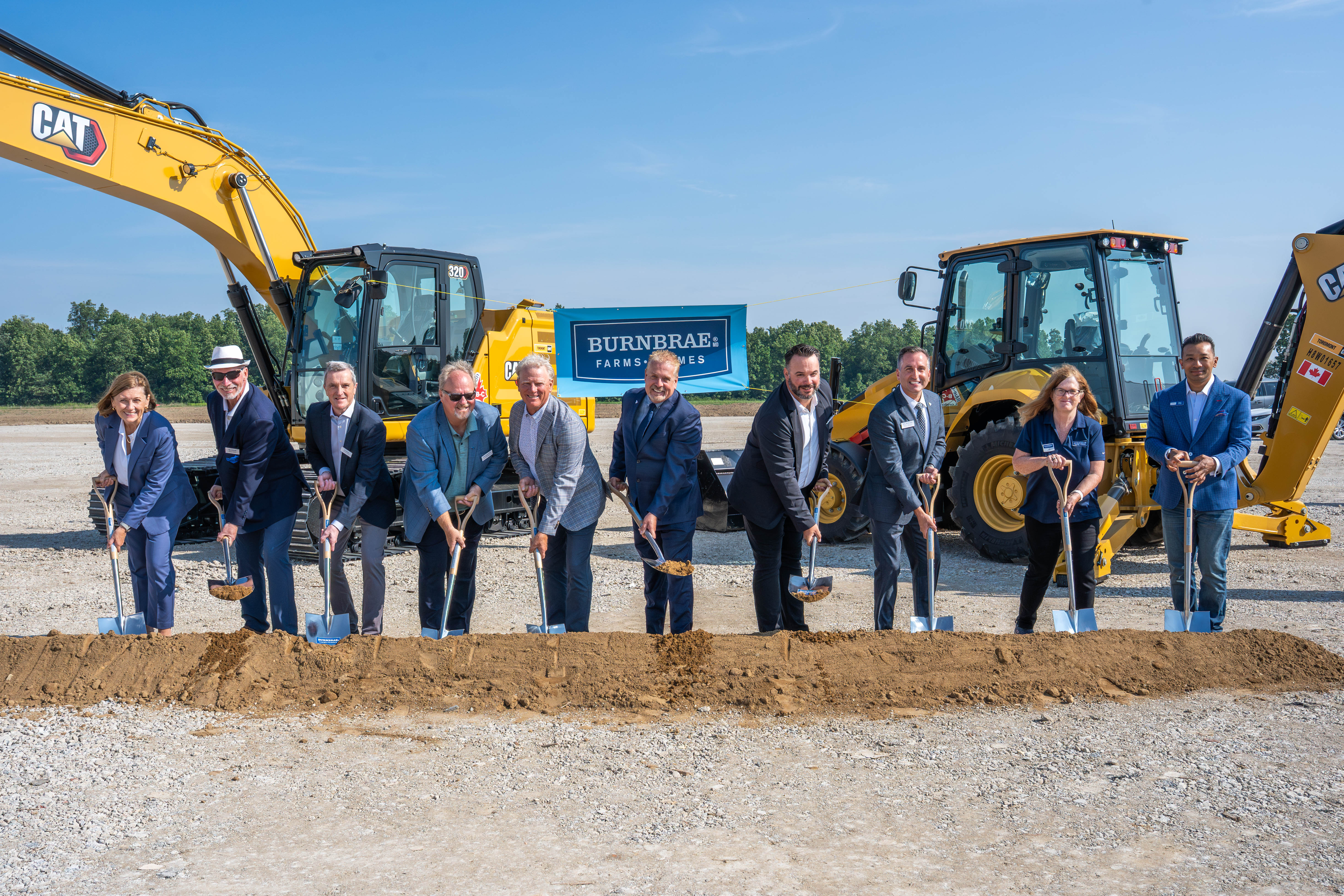 Attendees participate in the ground-breaking event in Strathroy, Ontario.