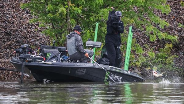 FLW Tour pro Tyler Stewart wrangles a fish into his net on Day Three of the FLW Tour on Lake Champlain presented by T-H Marine. (Rob Matsuura)