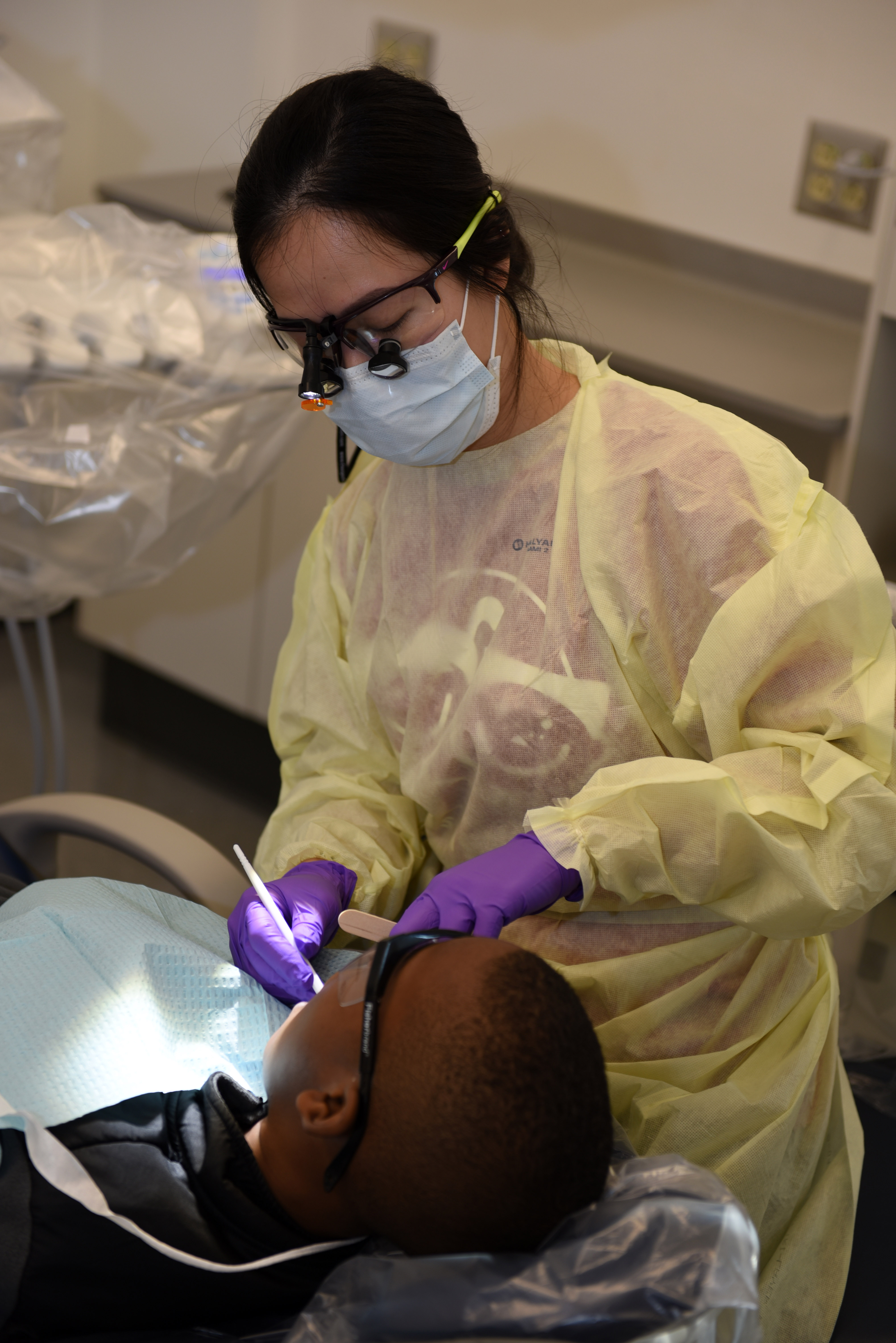 Student dentists from Indiana University School of Dentistry provide oral health care to children as part of Give Kids A Smile in 2019.