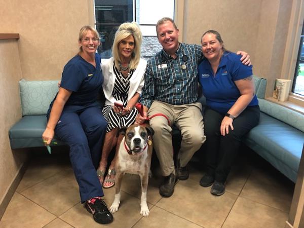 Jacqueline and Roman Toth with their new friends at PetCure Oncology in Phoenix
