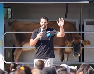 LA Chargers Player Josh Harris and Mobile Dairy Classroom Jersey Cow