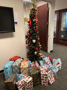 Associa Real Property Management Brings Holiday Cheer To Local Family