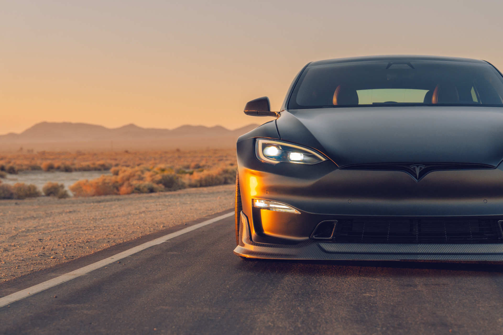 Unplugged Performance Tesla Model S-APEX Plaid Carbon Fiber Aero Suspension Carbon Ceramic Brakes BBK Wheels Image 1.7.jpg