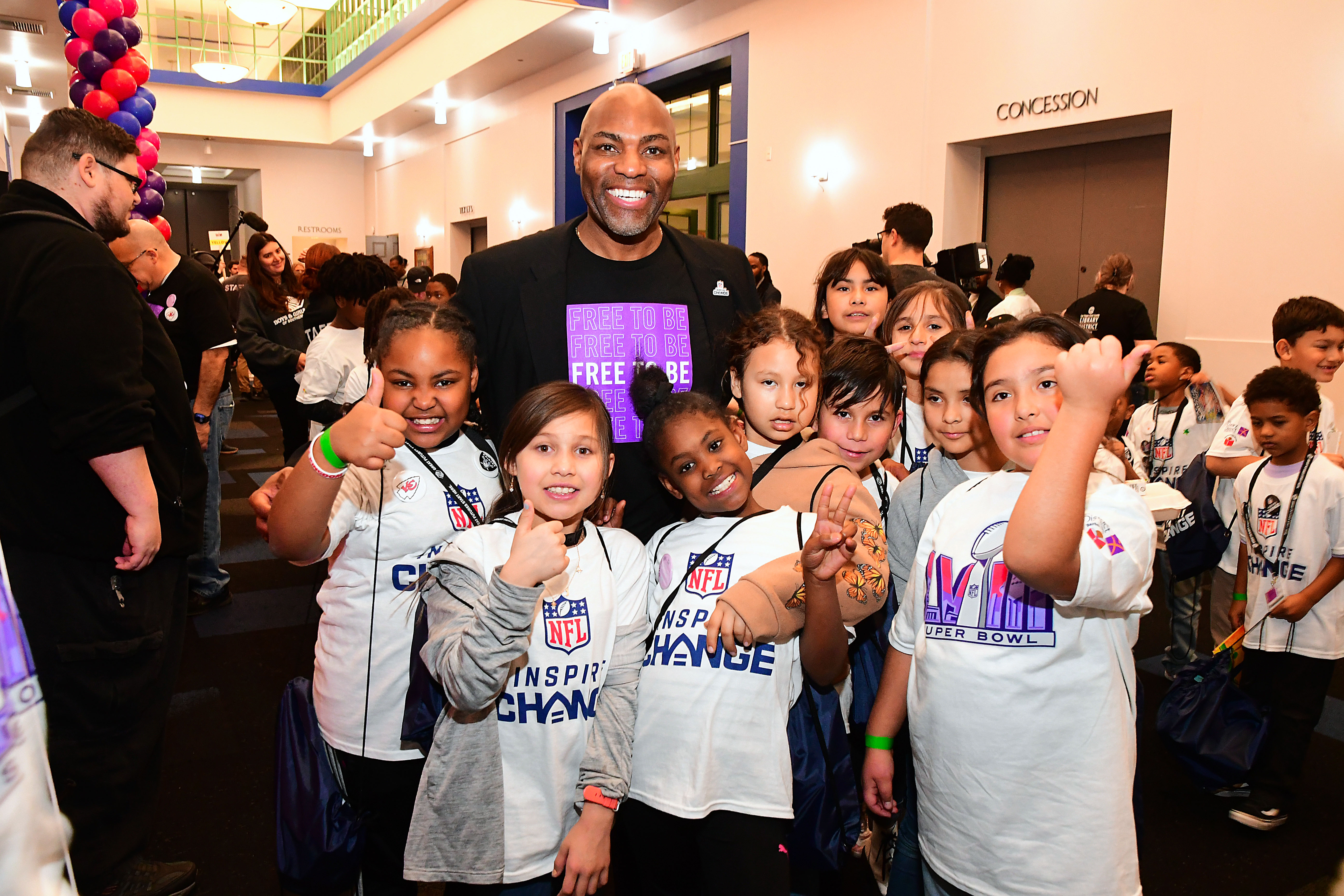 Library District Executive Director Kelvin Watson and Boys & Girls Clubs kids