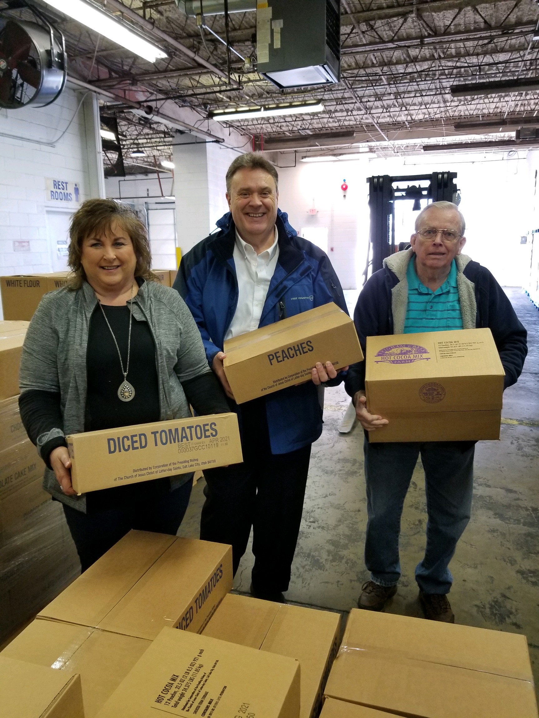 Several members of local Latter-Day Saints congregations volunteered to assist with the unloading of a tractor trailer that delivered 42,000 pounds of food to Christian Appalachian Project's Operation Sharing warehouse for distribution.