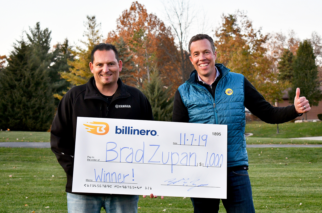 Billinero's October 2019 winner, Brad Zupan, with Billinero Executive Vice President, Chris Campbell outside Zupan's home in Indiana. Billinero™ is a mobile application that was launched in August 2019 by Centier Bank. The digital-only, prize-linked savings account has a game-like approach, offering customers the opportunity to win cash prizes of $1,000 monthly and at least $10,000 quarterly at no risk while also increasing their financial savings. The application is currently available to users who reside in Arkansas, Connecticut, Illinois, Indiana, Kansas, Michigan, Minnesota, Missouri, Nebraska, Oregon, South Carolina, or Virginia. For more information on Billinero™, go to http://www.billinero.com.