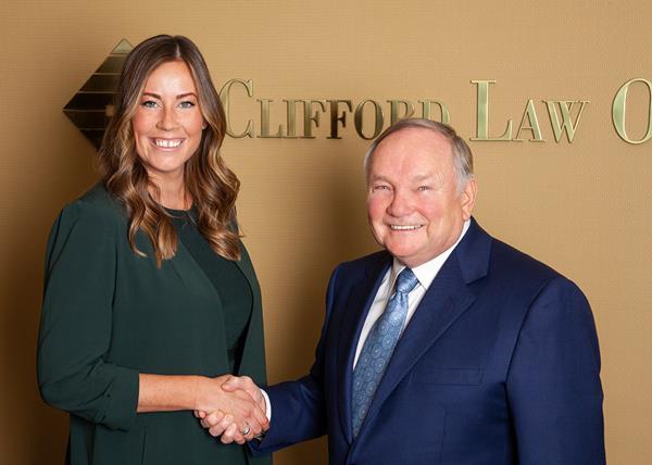 Sarah F. King alongside Founder and Senior Partner at Clifford Law Offices, Robert A. Clifford