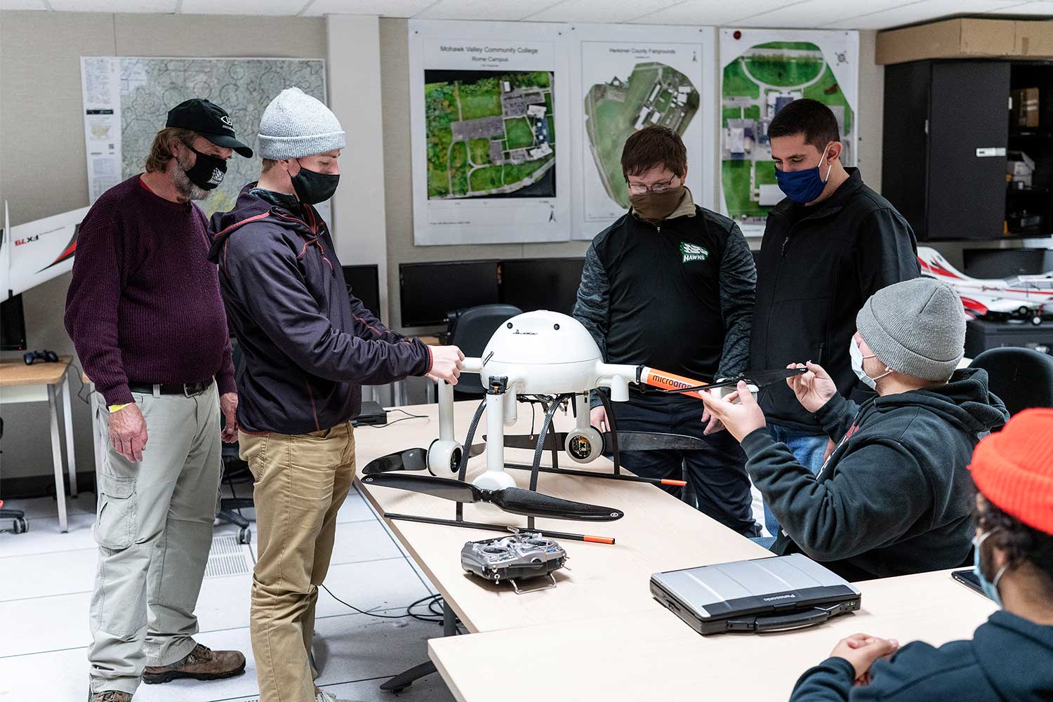 MVCC Professor Bill Judycki and students in the Piloted Aircraft Systems Program Classroom
