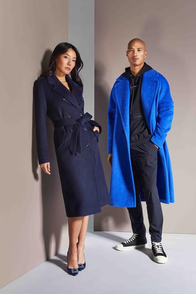 An image from the SENTALER MEN Fall Winter 2023/24 campaign featuring the Long Double Breasted Trench Coat in Deep Navy and Technical Bouclé Alpaca Robe Coat in Cobalt Blue
