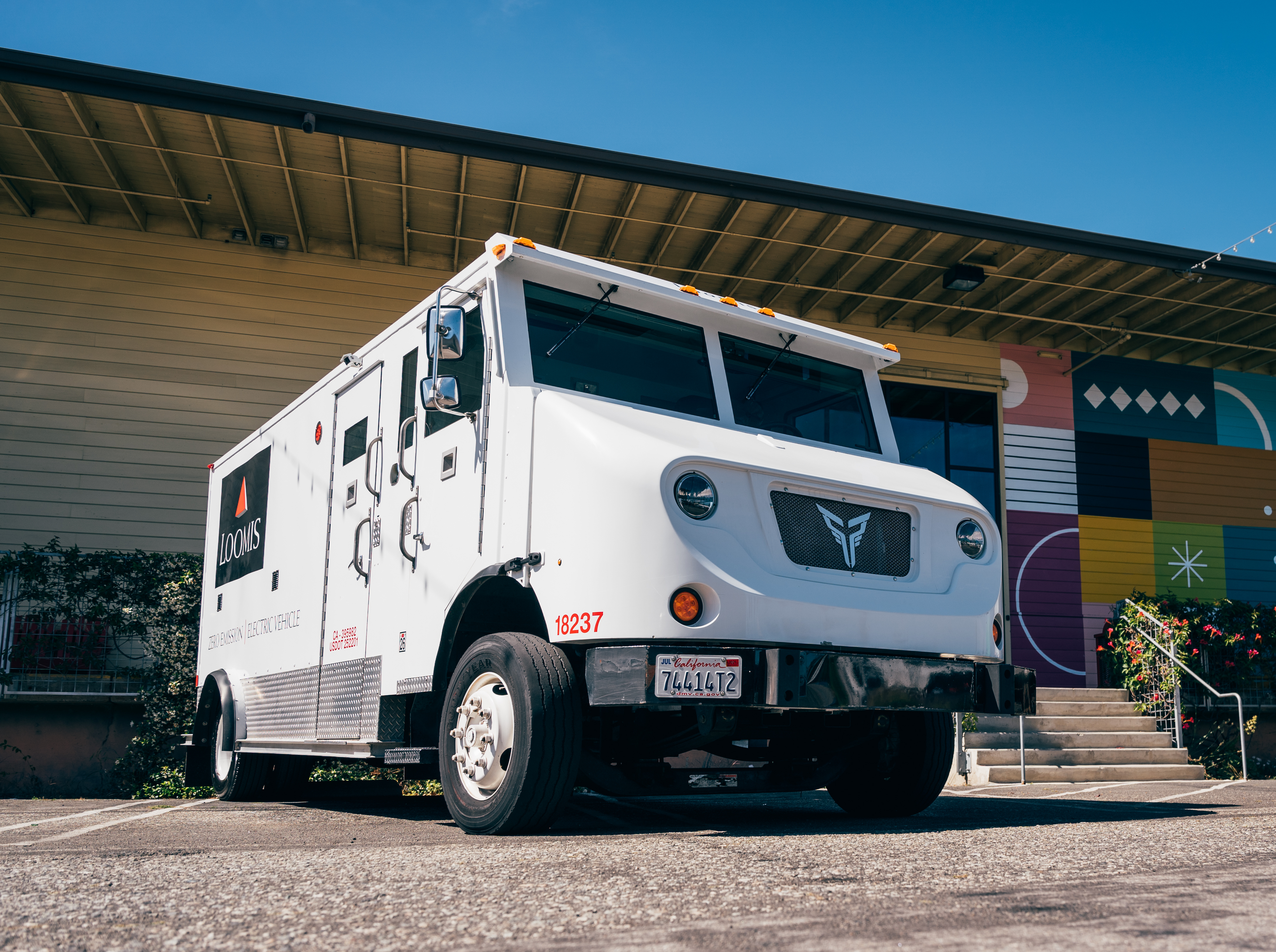 100% battery-electric armored Loomis vehicle manufactured by Xos