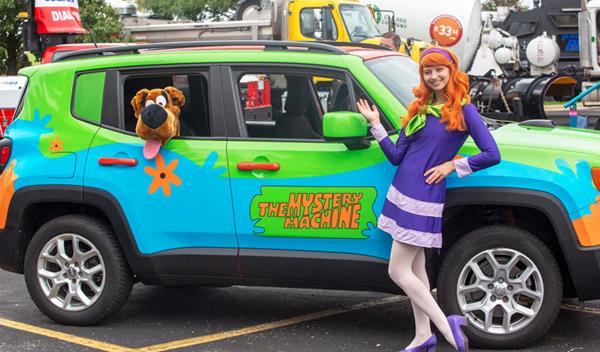 Gianni, dressed as Daphne, and the Mystery Machine were an attraction at the COD Food Truck Rally and Sunset 5K on Oct. 5. Gianni used the opportunity to talk to attendees about her love for costume design and creativity.