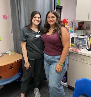 Bella Stosic (right) is shown with her speech therapist Abby Marodi, MSCC-SLP, at the Center for Children's Rehabilitation at Penn Highlands Mon Valley.