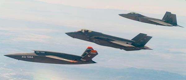 Kratos XQ-58A in flight with F-35 and F-22