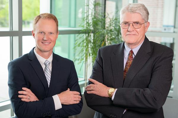Dr. Jed Hancock (left) has been appointed President of Utah State University’s Space Dynamics Laboratory effective July 1, 2021. Hancock will succeed SDL President H. Scott Hinton (right), who will retire on June 30, 2021. (Credit: Allison Bills/Space Dynamics Laboratory)