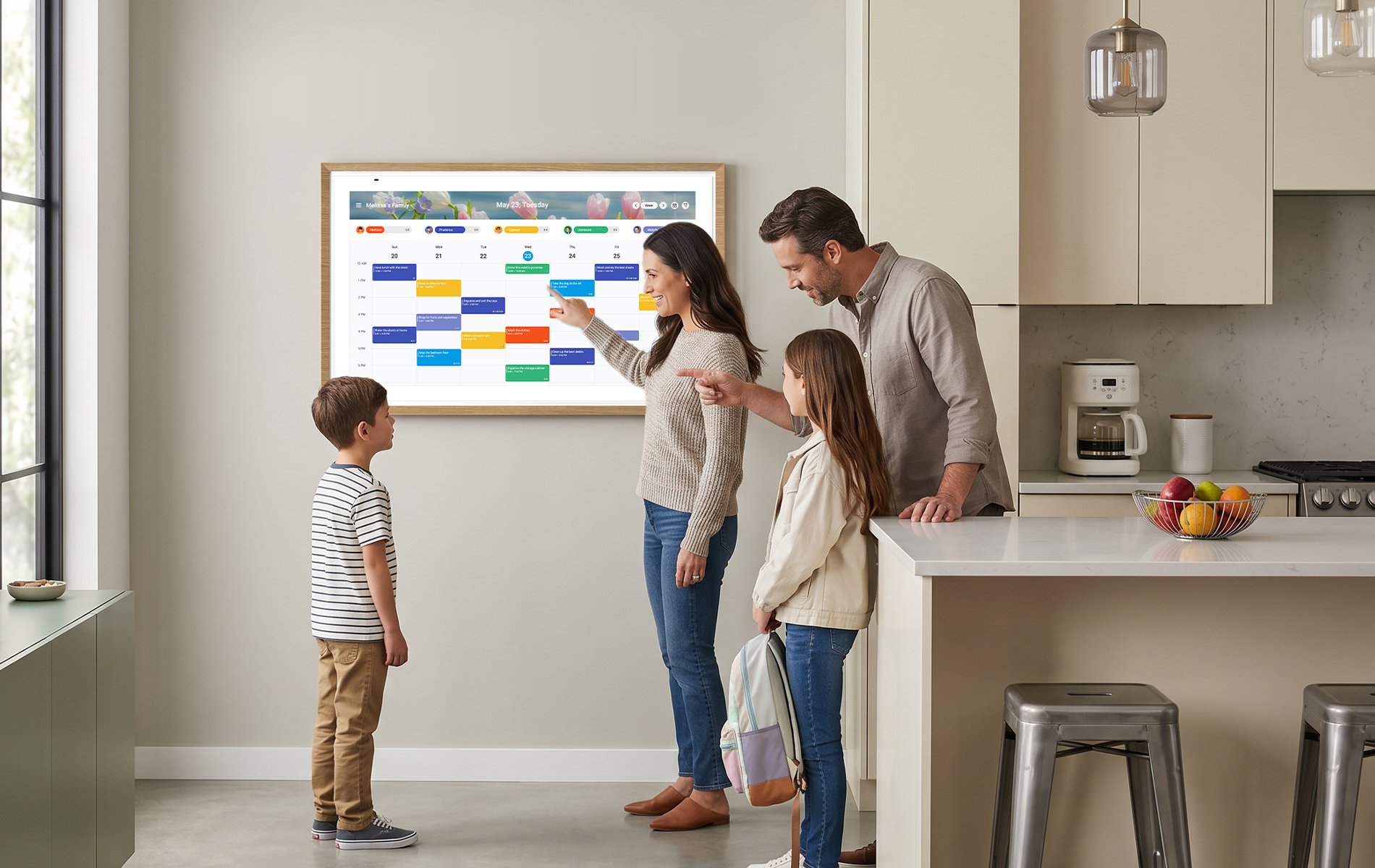 Apolosign digital calendar displaying a shared family schedule as parents and children check routines before back-to-school season